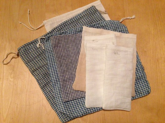 handsewn linen bags in white and check