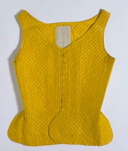 Waistcoat. Silk quilted and bound with silk grosgrain ribbon. ca. 1745. V&A Museum, T.87-1978