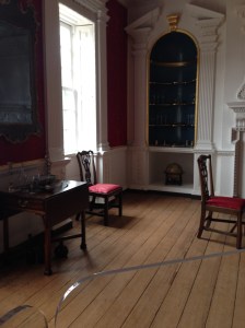 Red damask on the walls, because "they could have had it." Infelicitous phrasing.